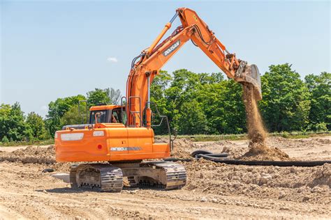 building a road with a mini excavator|Mini Excavator Building A Dirt Access Road .